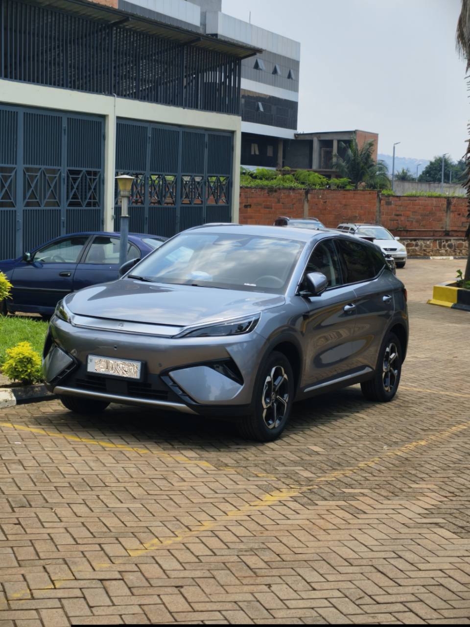 The client’s grey 2025 BYD Yuan Plus after delivery
