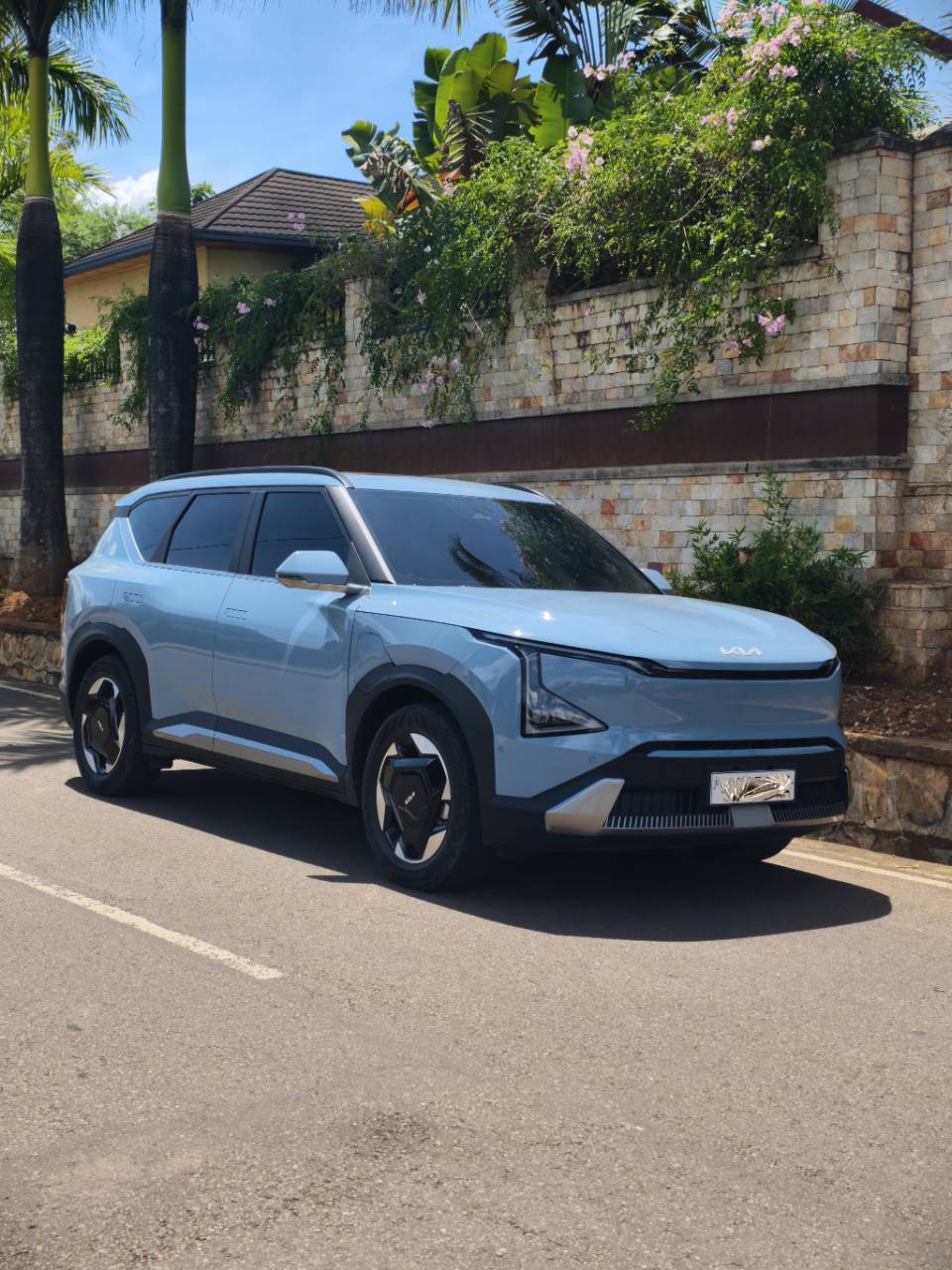 The client’s light blue 2024 Kia EV5 Land delivered in May 2026